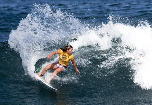 The Enchanting Art of Surfing: Mastering the Waves with Grace and Grit